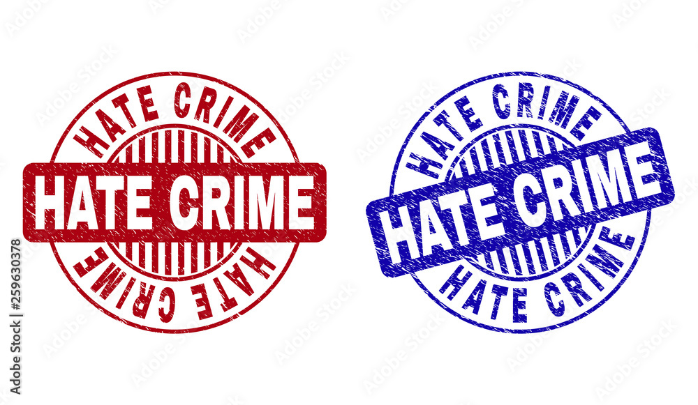 Grunge HATE CRIME round stamp seals isolated on a white background. Round seals with distress texture in red and blue colors. Vector rubber imprint of HATE CRIME tag inside circle form with stripes. Grunge HATE CRIME round stamp seals isolated on a white background. Round seals with distress texture in red and blue colors. Vector rubber imprint of HATE CRIME tag inside circle form with stripes.