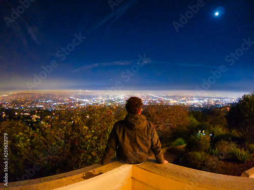 young boy looking to the city of L.A.