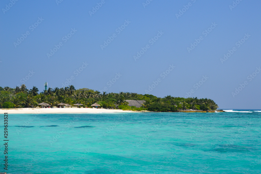 Beautiful tropical Maldives island with beach , sea , and coconut palm tree on blue sky for nature holiday vacation background concept -Boost up color Processing