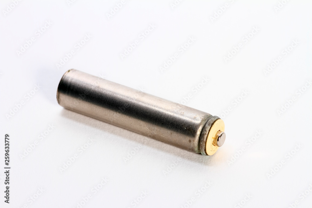 Single battery cell isolated on a white background Single battery cell isolated on a white background