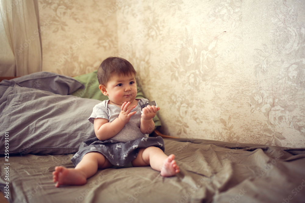 funny chubby baby with phone plays and nibbles funny chubby baby with phone plays and nibbles