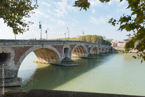 The Pont Neuf, the Saint-Jacques hospital and the Garona River. Toulouse. photo