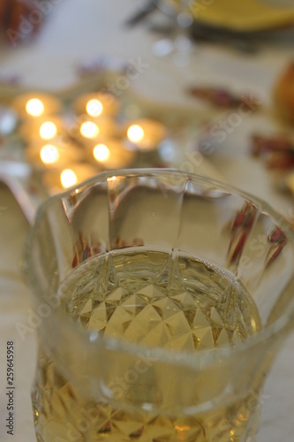 glass of champagne and candlelight