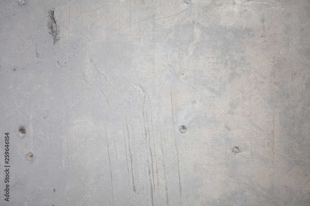 Formwork traces on concrete. Repair and construction or constructing. Concrete background. Grey color. Cement texture. Poor quality curve wall. Flaws, defects and cracks in the wall. . Formwork traces on concrete. Repair and construction or constructing. Concrete background. Grey color. Cement texture. Poor quality curve wall. Flaws, defects and cracks in the wall. .