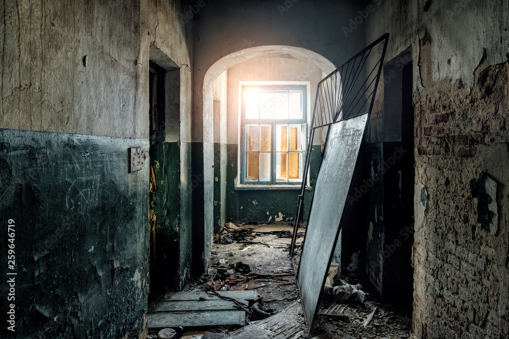 Dark and creepy corridor of old abandoned hospital