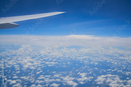 travel on the plane with skyline and cloud
