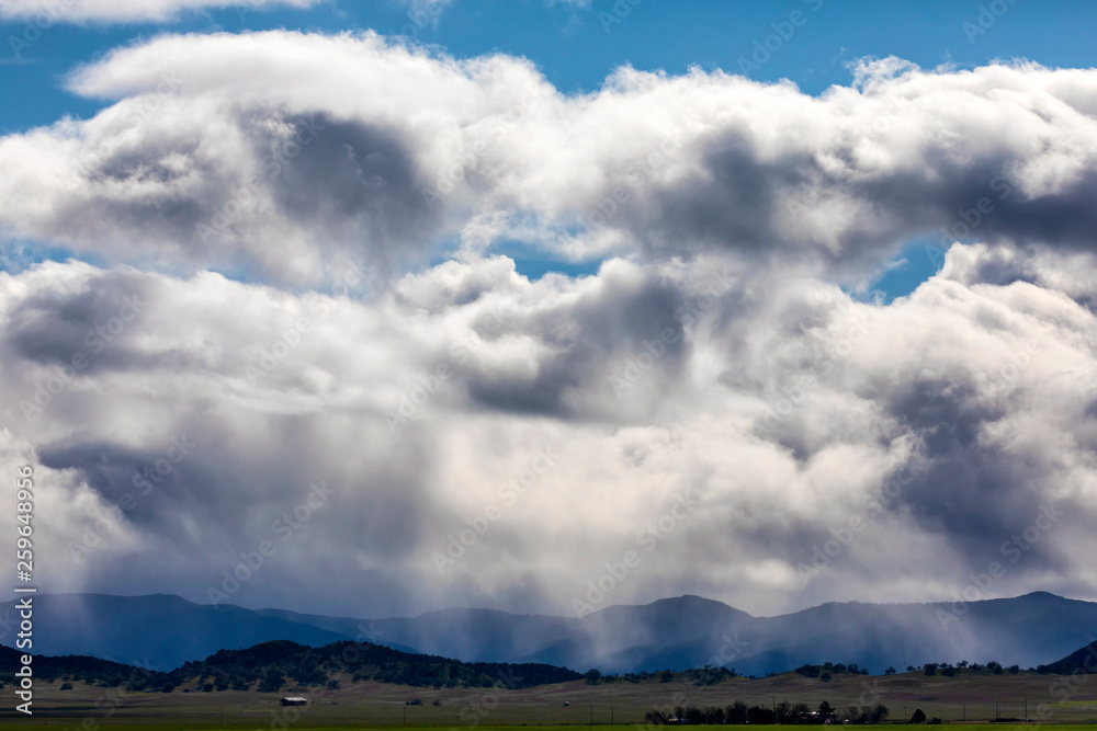 Rain and Rain Clouds Above Valley Floor Rain and Rain Clouds Above Valley Floor