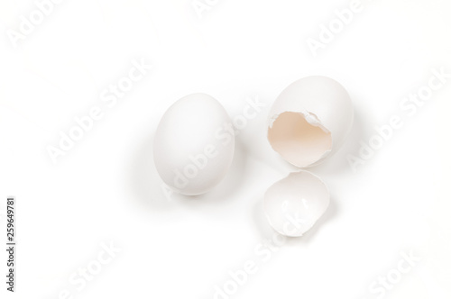White egg and yolk.. Raw eggs on white background.