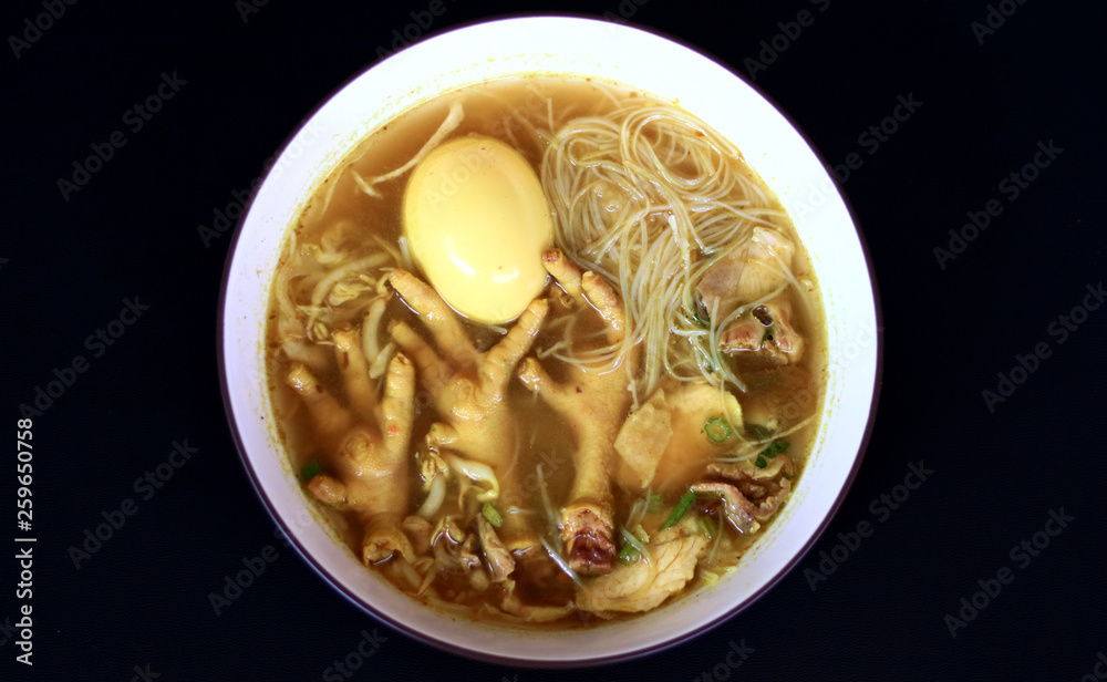 Soto ceker or chicken feet soup on white background. Soto ceker or chicken feet soup on white background.