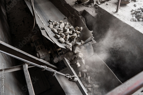 Industrial belt conveyor moving raw materials from mine
