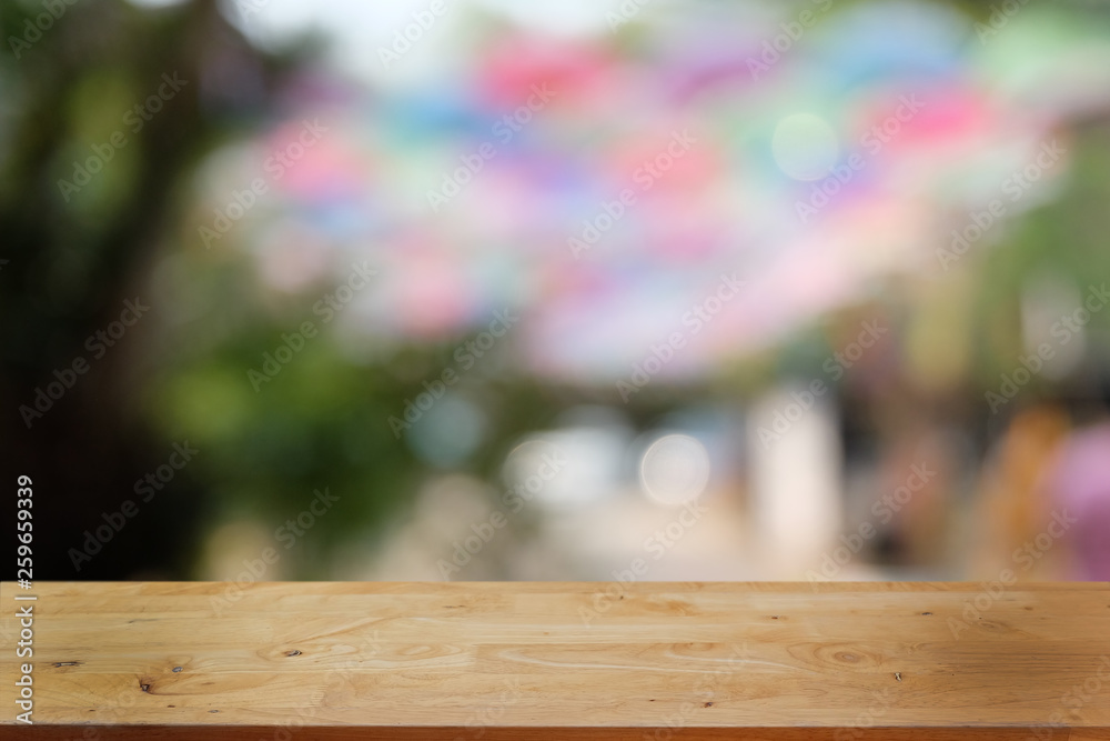 Empty dark wooden table in front of abstract blurred bokeh background of restaurant . can be used for display or montage your products.Mock up for space. Empty dark wooden table in front of abstract blurred bokeh background of restaurant . can be used for display or montage your products.Mock up for space.