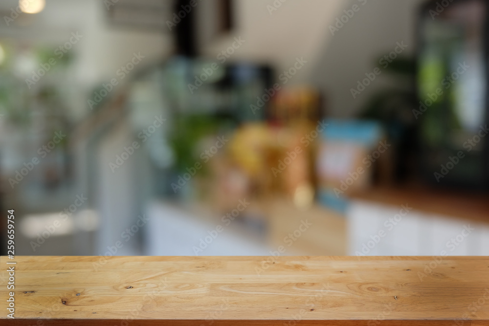 Empty dark wooden table in front of abstract blurred bokeh background of restaurant . can be used for display or montage your products.Mock up for space. Empty dark wooden table in front of abstract blurred bokeh background of restaurant . can be used for display or montage your products.Mock up for space.