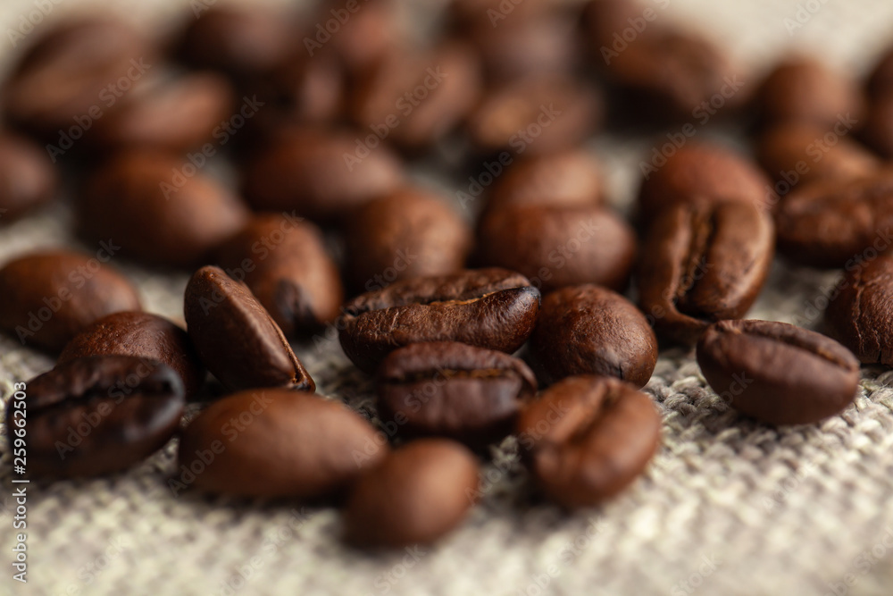 Close up of coffee beans on cloth sack Close up of coffee beans on cloth sack