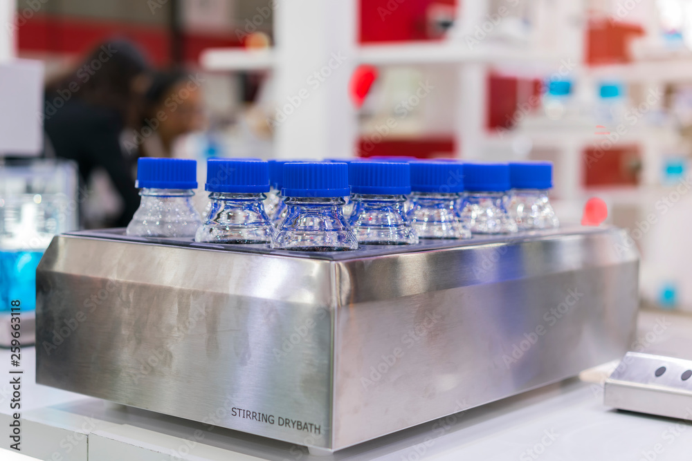 high technology and modern of multi point stirring dry bath machine for scientific with lab flask at laboratory high technology and modern of multi point stirring dry bath machine for scientific with lab flask at laboratory