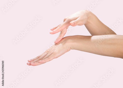 Beautiful hands isolated  applying cream  massaging with clipping path.