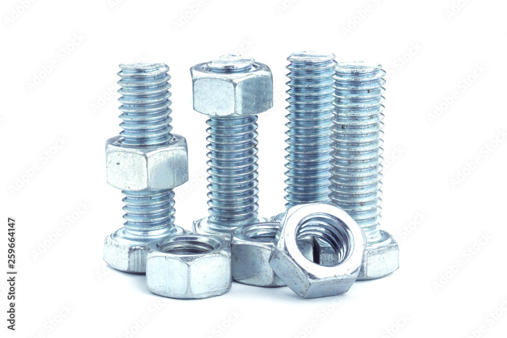 Closeup Bolts, steel screwbolts and nuts Used for capturing workpieces mechanical parts And construction isolated on a white background industrial concept Closeup Bolts, steel screwbolts and nuts Used for capturing workpieces mechanical parts And construction isolated on a white background industrial concept