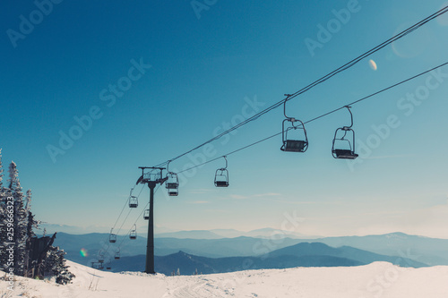 Ski lift on the slop in mountain ski resort