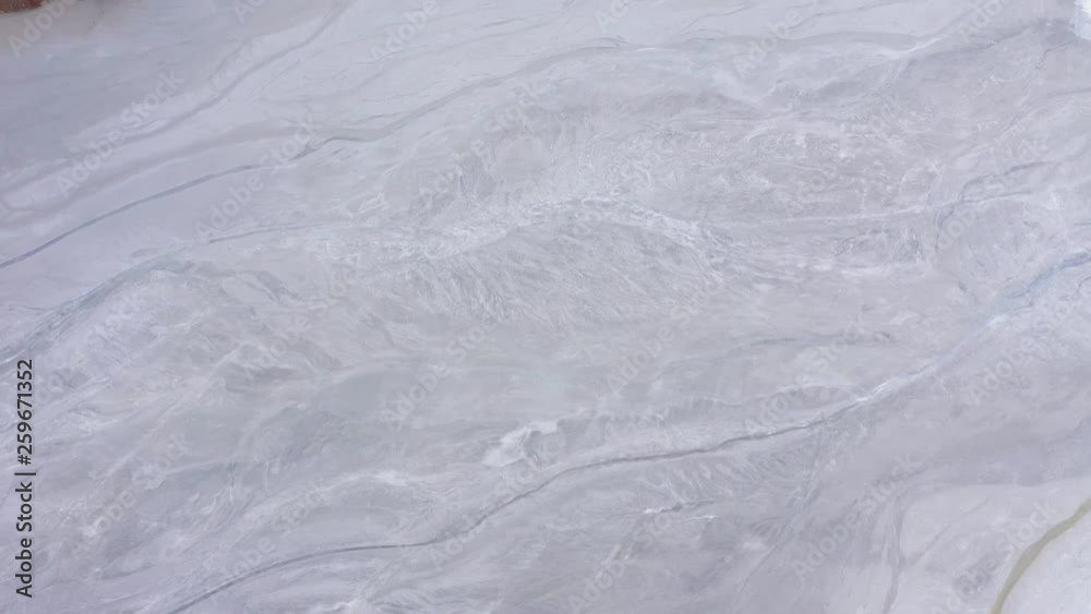 Flying over patterns of colorful mining chemical residuals, cyanide nature pollution from gold mine. Ecological catastrophe, 4k aerial drone view Flying over patterns of colorful mining chemical residuals, cyanide nature pollution from gold mine. Ecological catastrophe, 4k aerial drone view