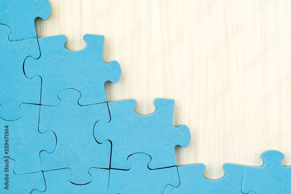 Obraz premium Unfinished blue puzzle