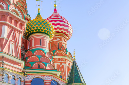 St Basil's cathedral on Red Square in Moscow. Domes the cathedral against blue sky. Copy space