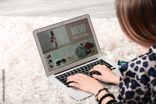 Young woman shopping online...