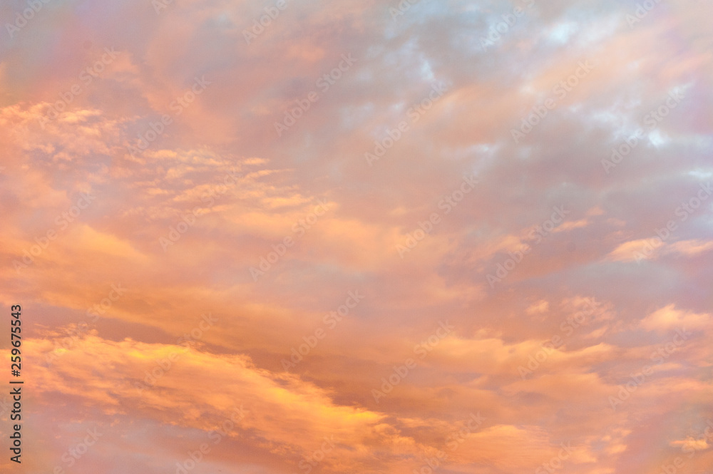 Colorful clouds create an abstract ethereal painterly like mood in the sky