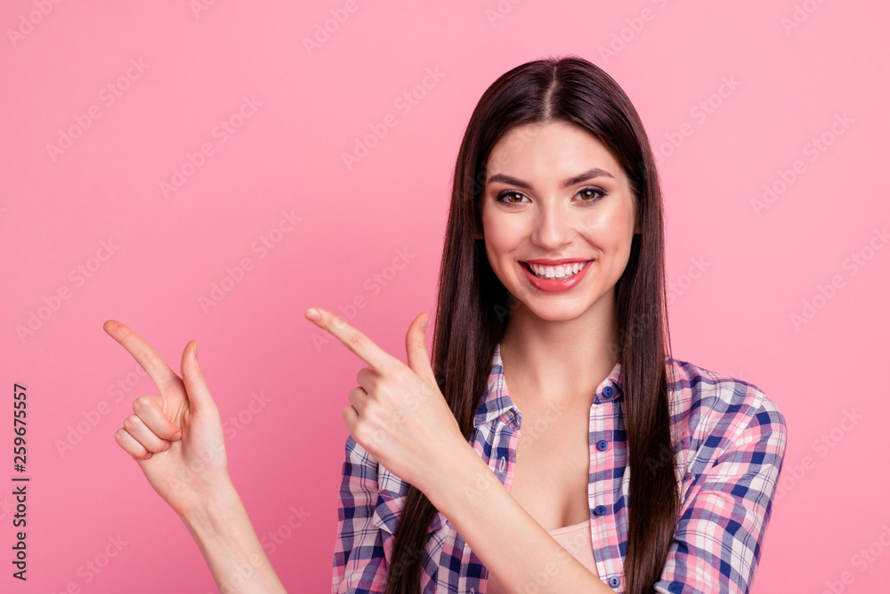 Close up photo beautiful amazing her she lady hands arms index fingers indicate empty space promotional advising buy buyer wear casual checkered plaid shirt clothes outfit isolated pink background Close up photo beautiful amazing her she lady hands arms index fingers indicate empty space promotional advising buy buyer wear casual checkered plaid shirt clothes outfit isolated pink background
