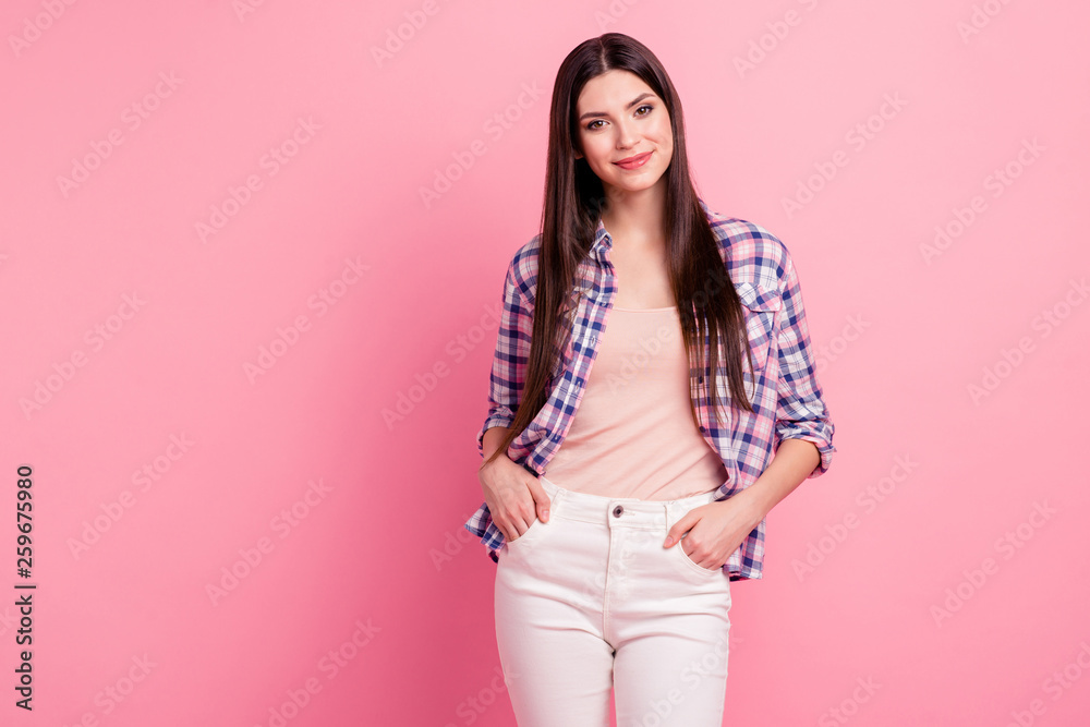 Portrait of her she nice-looking attractive cute charming well-groomed lovely adorable straight-haired lady holding hands in pockets isolated over pink pastel background Portrait of her she nice-looking attractive cute charming well-groomed lovely adorable straight-haired lady holding hands in pockets isolated over pink pastel background