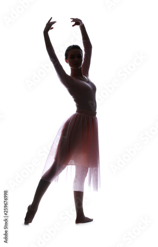 Silhouette of beautiful young ballerina on white background