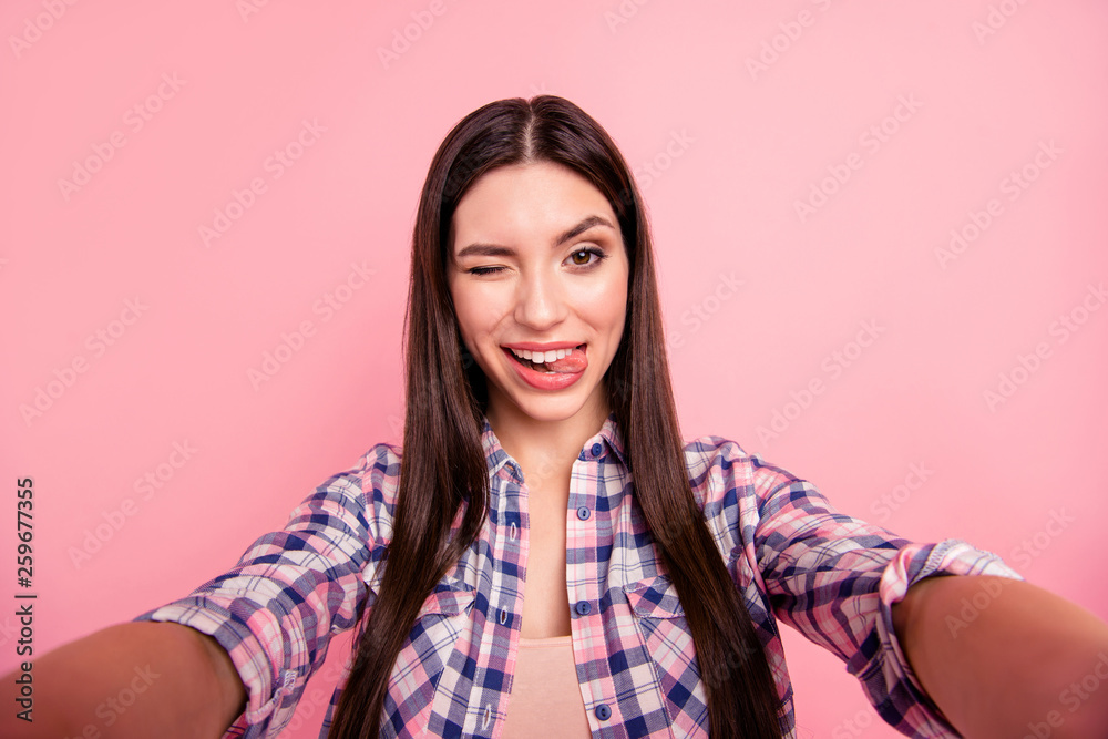 Self-portrait of her she nice-looking attractive cute charming sweet winsome lovely lovable cheerful crazy straight-haired lady wearing checked shirt showing tongue out isolated on pink background Self-portrait of her she nice-looking attractive cute charming sweet winsome lovely lovable cheerful crazy straight-haired lady wearing checked shirt showing tongue out isolated on pink background