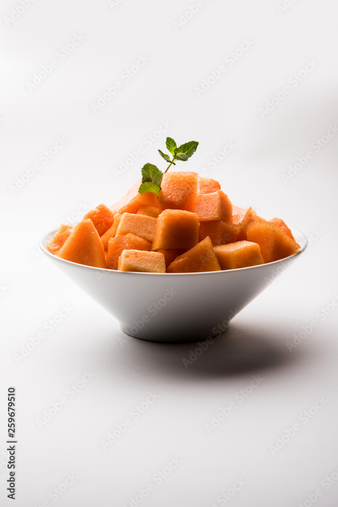 Cantaloupe / muskmelon / kharbuja cut into pieces, served in a bowl. selective focus Cantaloupe / muskmelon / kharbuja cut into pieces, served in a bowl. selective focus