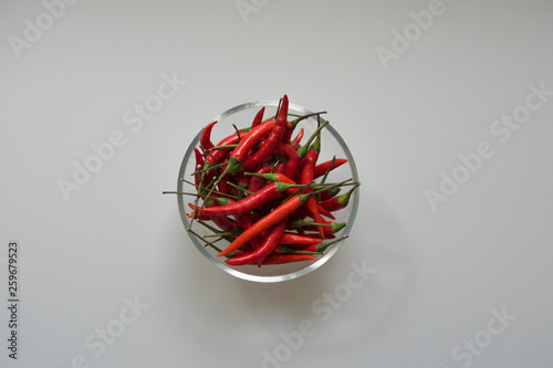 Close-up of red hot chili cayenne peppers handful