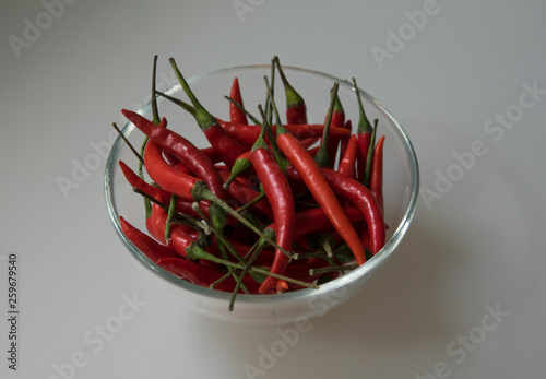 Close-up of red hot chili cayenne peppers handful