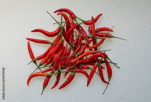 Close-up of red hot chili cayenne peppers handful 