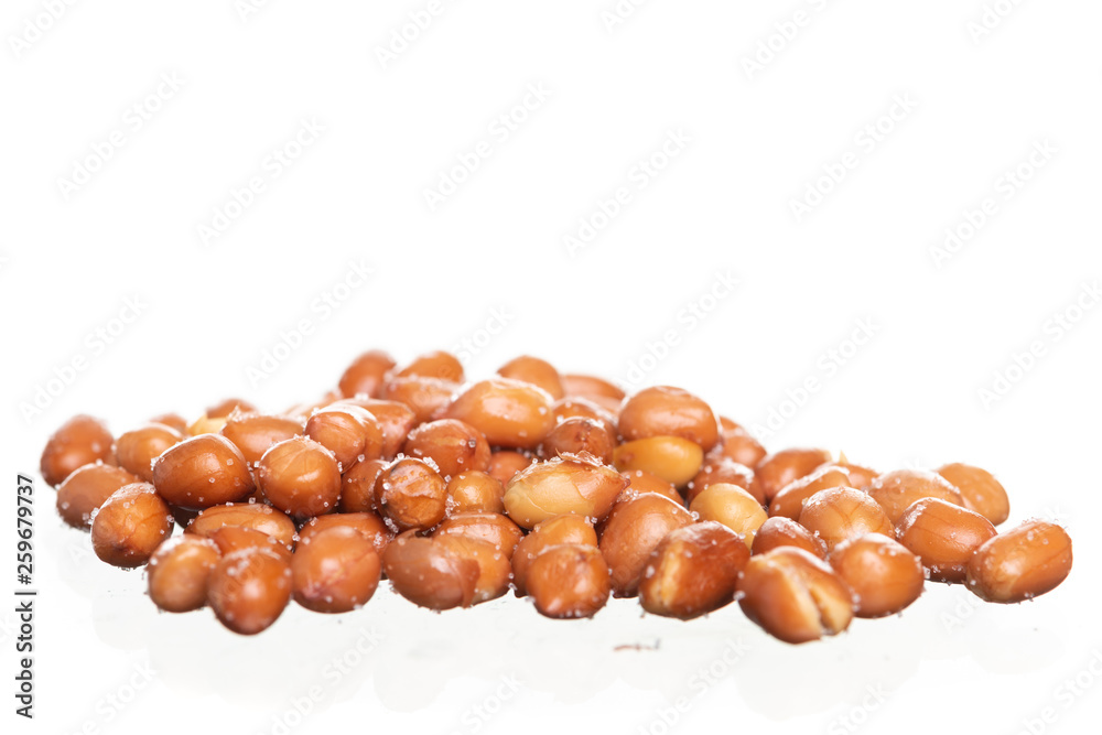 Salt roasted peanuts isolated on white