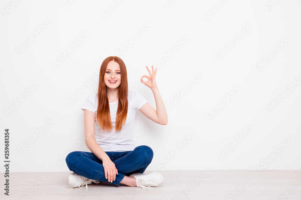 Full length body size photo beautiful she her lady sit floor legs crossed hand arm fingers okey symbol advise buy buyer tested checked quality wear casual t-shirt jeans denim isolated white background Full length body size photo beautiful she her lady sit floor legs crossed hand arm fingers okey symbol advise buy buyer tested checked quality wear casual t-shirt jeans denim isolated white background