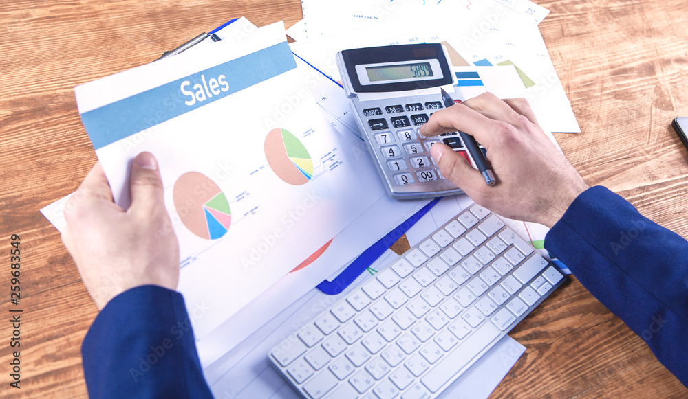 businessman calculator and tax businessman calculator and tax