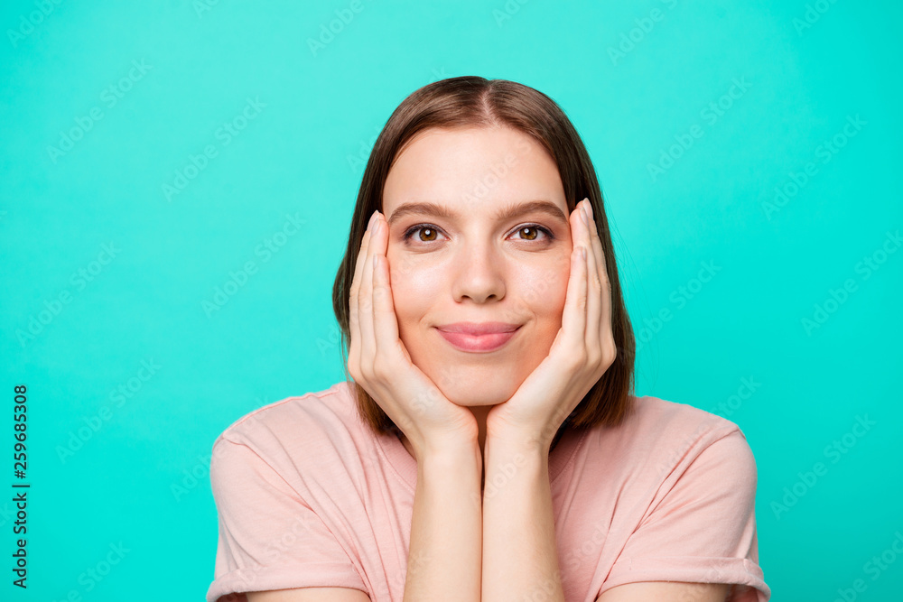 Close up photo of pretty charming sweet hipster have weekends holidays feel glad friendly touch hands cheeks face chin isolated wear pastel-colored clothing on teal background Close up photo of pretty charming sweet hipster have weekends holidays feel glad friendly touch hands cheeks face chin isolated wear pastel-colored clothing on teal background