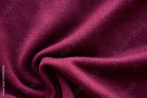 Purple texture of a knitted English elastic pattern