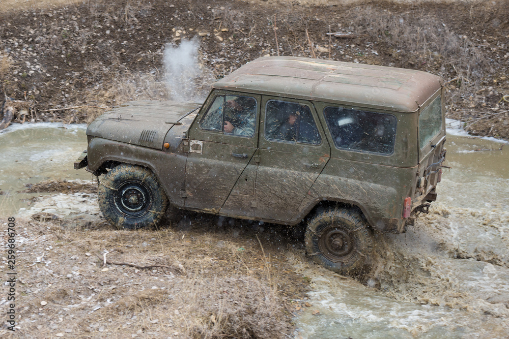 Russian SUV, Off-road vehicle slips, Stuck in the river Russian SUV, Off-road vehicle slips, Stuck in the river