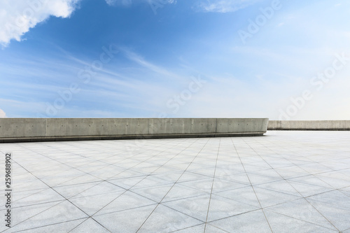 Empty floor and blue sky and white clouds scene