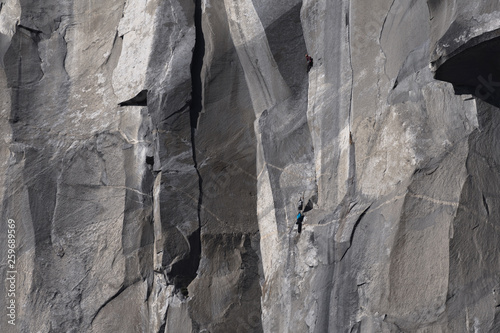 Climbers attempt to climb jagged granite of El Capitan in Yosemite National Park