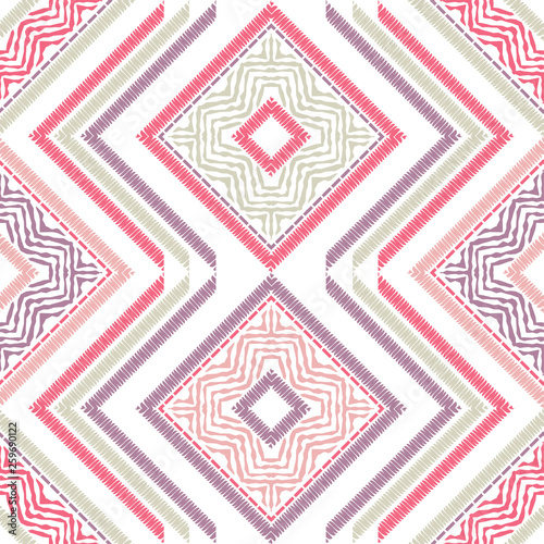 Ethnic boho seamless pattern. Embroidery on fabric. Patchwork texture. Weaving. Traditional ornament. Tribal pattern. Folk motif. Can be used for wallpaper, textile, invitation card, wrapping, web pag
