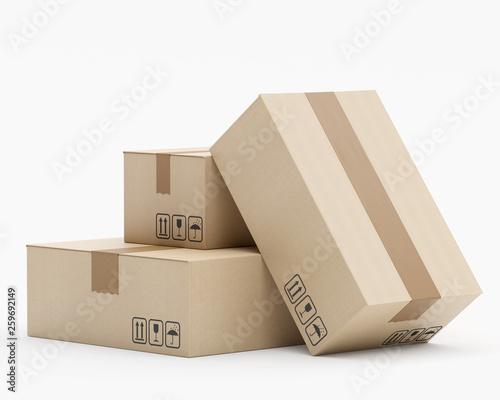 Zwei Kartons unterschiedlicher Größe stehen aufeinander - ein Karton lehnt an - Perspektive von der Seite