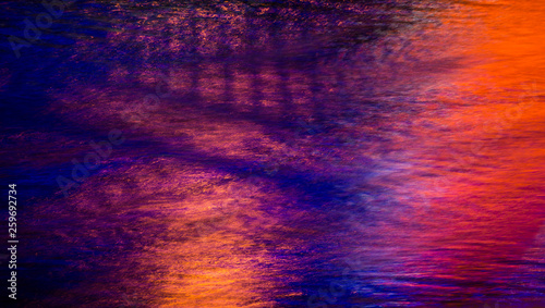 Colorful light reflection on the water