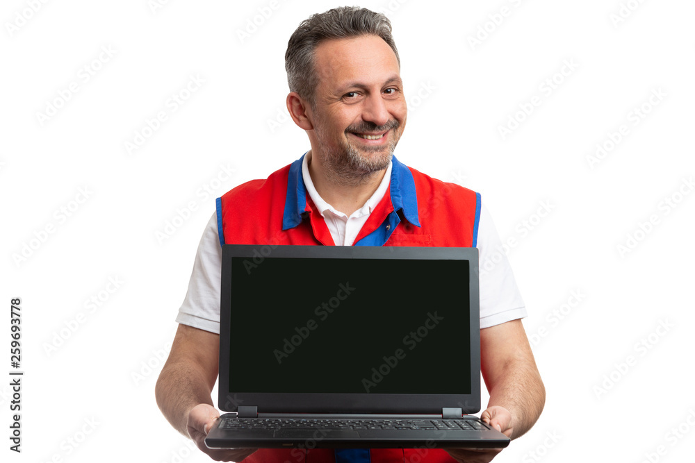 Supermarket employee presenting laptop. Supermarket employee presenting laptop.