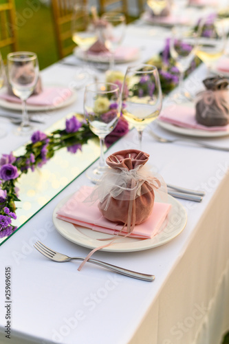 Table setting at a luxury wedding and Beautiful flowers on the table.