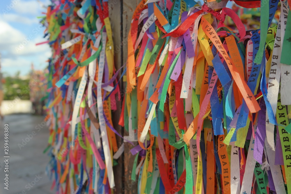 Fototapeta premium Igreja de Nosso Senhor do Bonfim, a catholic church located in Salvador, Bahia in Brazil. Famous touristic place where people make wishes while tie the ribbons in front of the church. Carnival land.