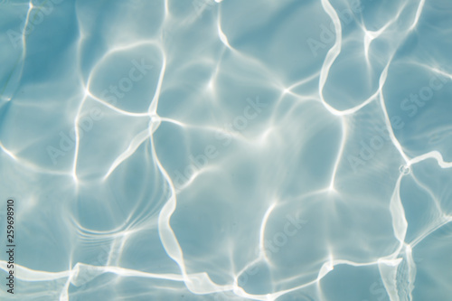 Beautiful Abstract water background, Swimming pool rippled.