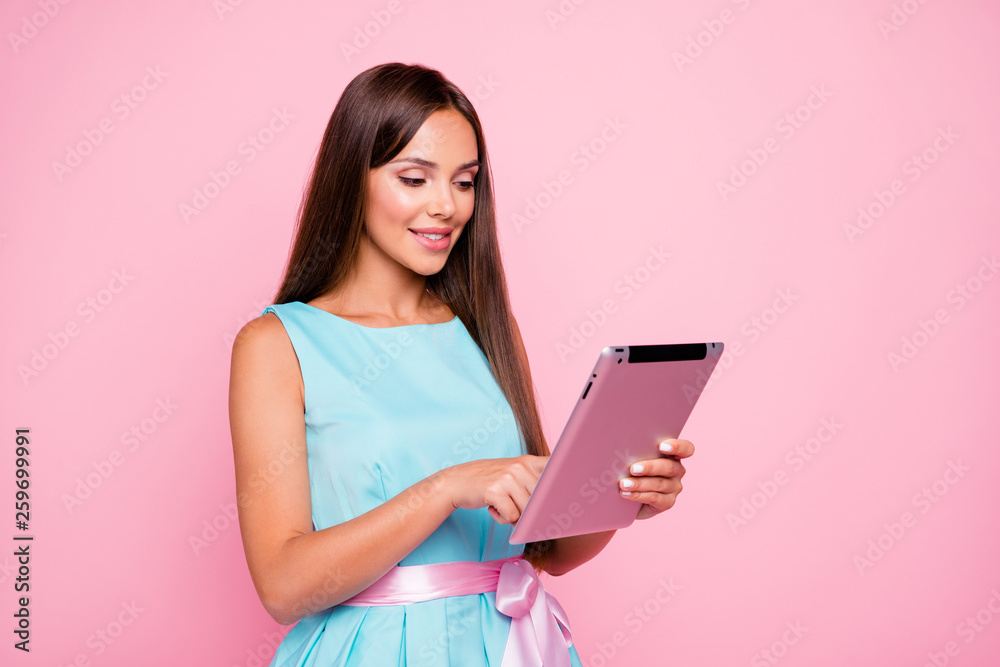 Portrait of her she nice-looking attractive stunning winsome sweet elegant cheerful straight-haired lady holding in hands tablet wi-fi connection isolated over pink pastel background Portrait of her she nice-looking attractive stunning winsome sweet elegant cheerful straight-haired lady holding in hands tablet wi-fi connection isolated over pink pastel background